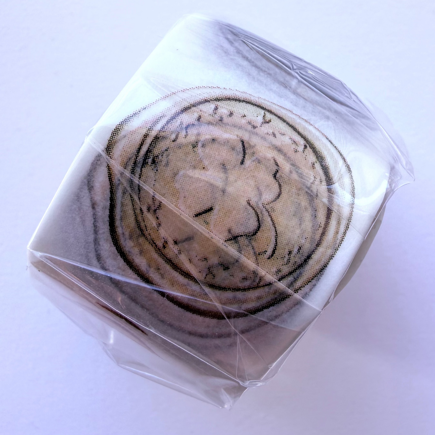 Washi tape roll by MT depicting sealing was stamps on white background