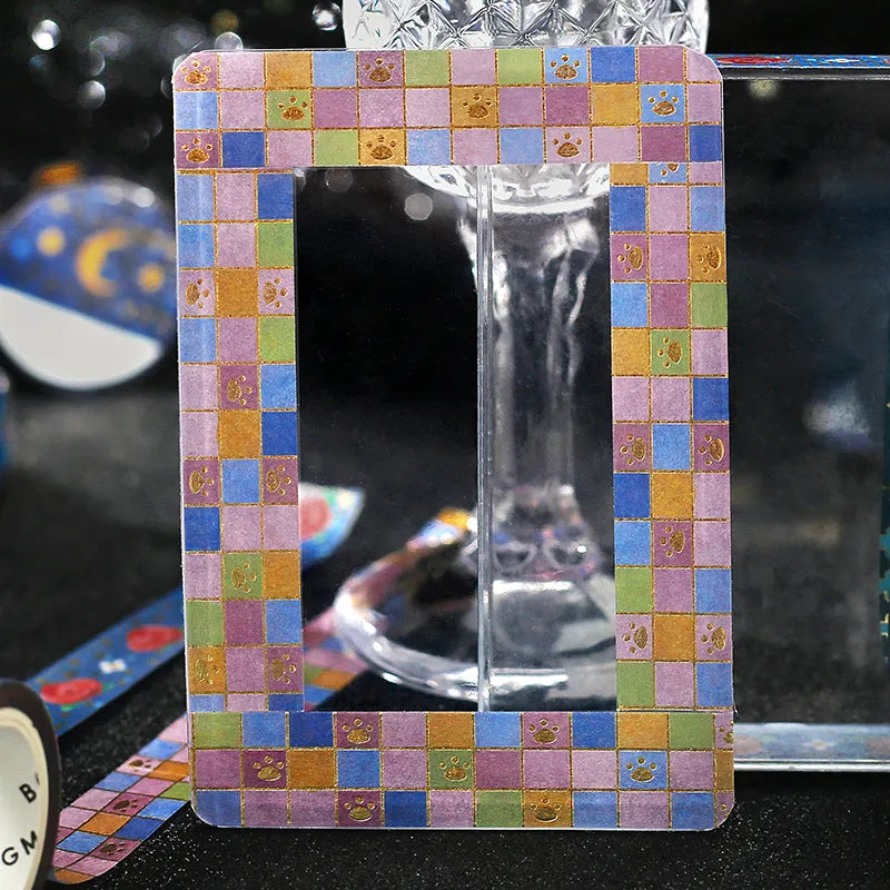 A frame made by washi tape on a black background