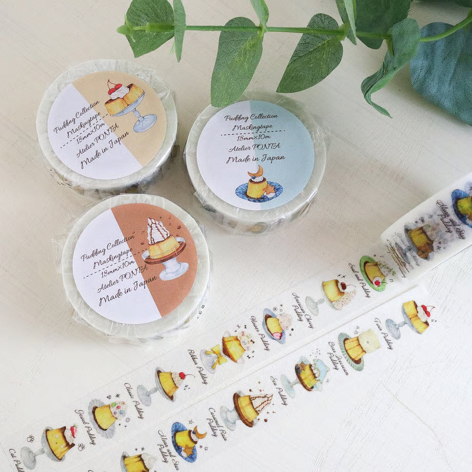 Small round containers with colorful labels featuring illustrations of desserts on a light background.
