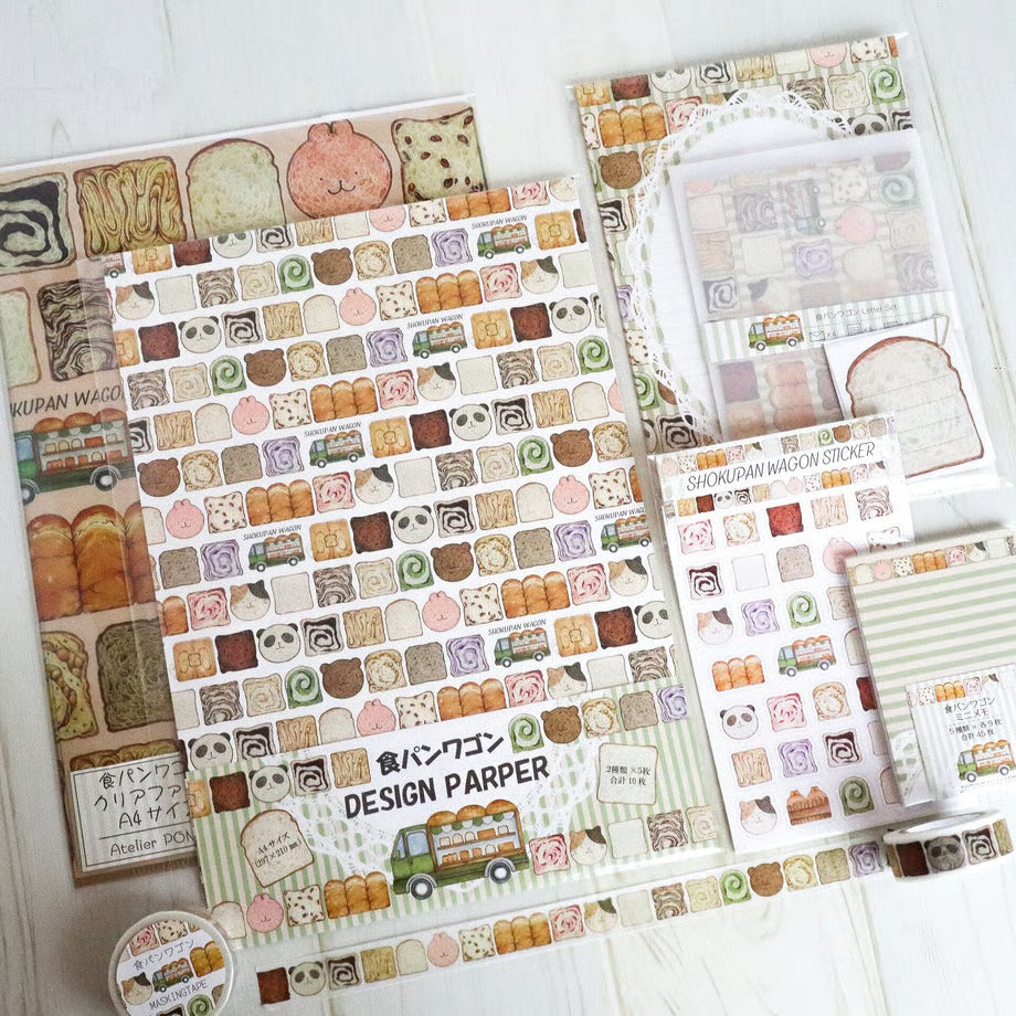 Collection of design paper sheets with various patterns on a white surface
