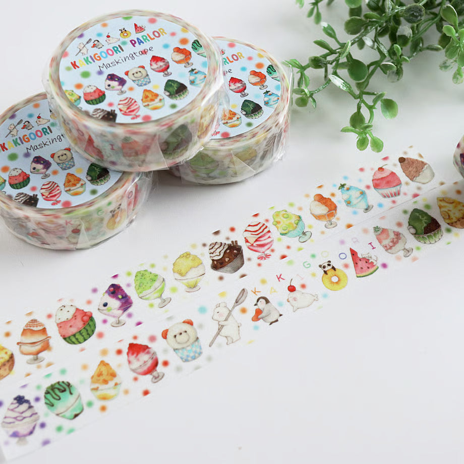 Colorful washi tape with cartoon ice cream designs on a white surface.