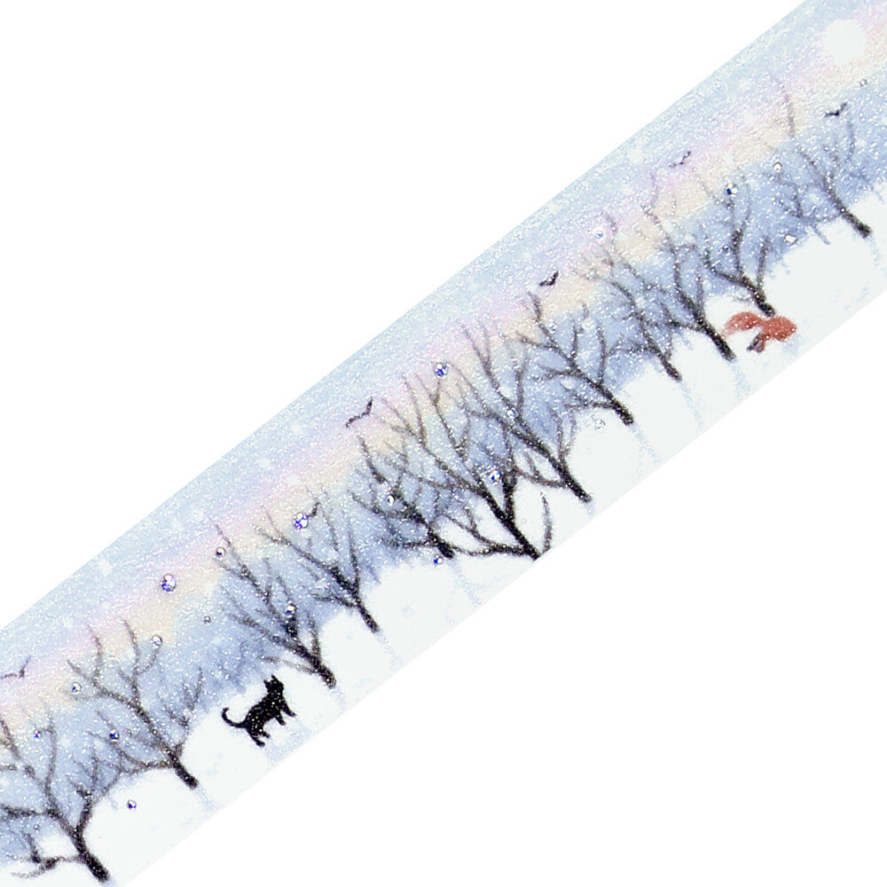 Roll of decorative paper with winter scene design featuring trees and animals.