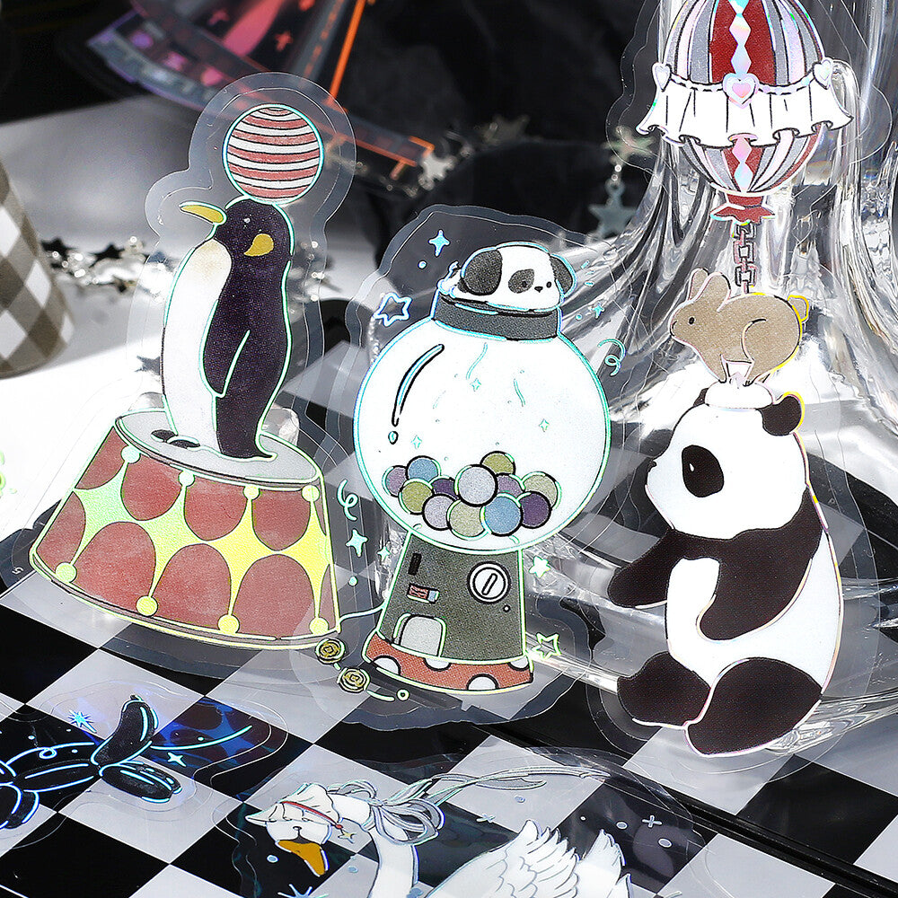 Set of colorful cartoon-style penguin, panda, and mouse figurines on a checkered background.