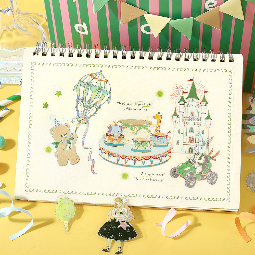 Illustrated notebook with a colorful design on a yellow surface with decorative elements.
