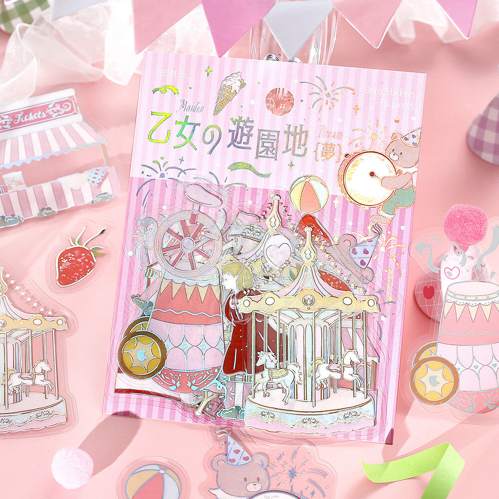 Pack of stickers with a pink theme featuring a carousel and other decorative elements on a matching pink background.