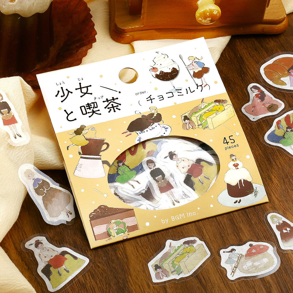 Sticker set with illustrated characters and objects on a wooden surface