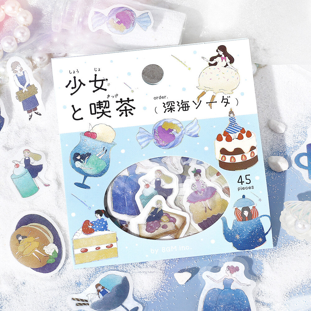 Sticker set packaging with illustrations of girls and tea-themed designs on a light blue background.