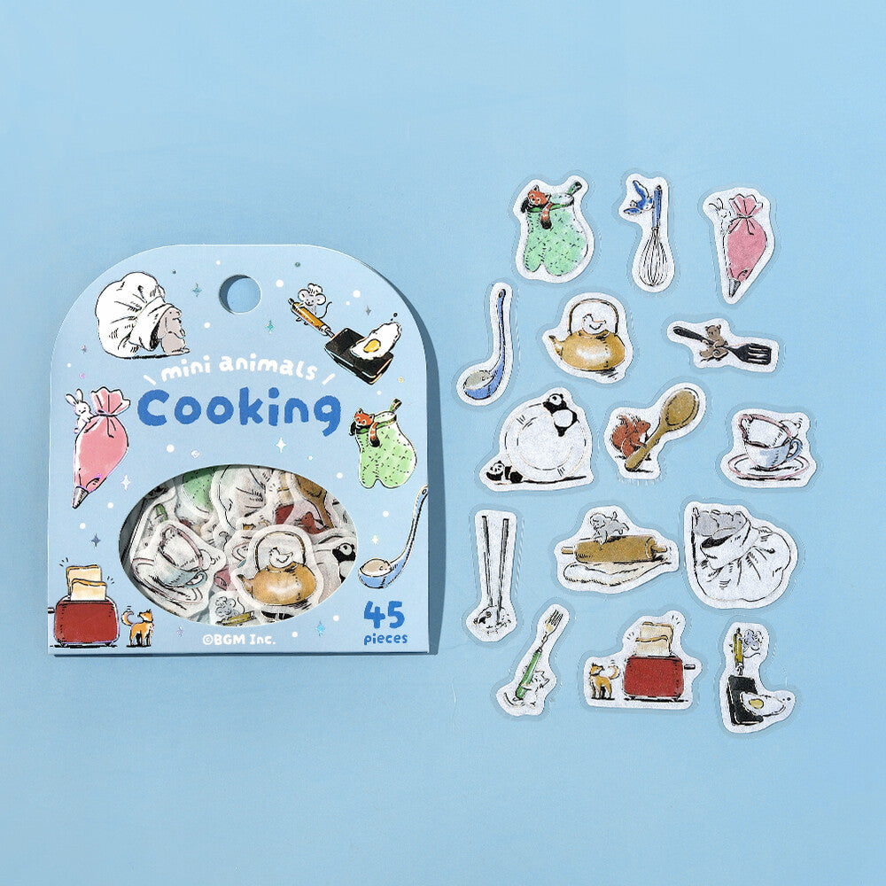 Set of miniature animal cooking-themed stickers with packaging on a blue background