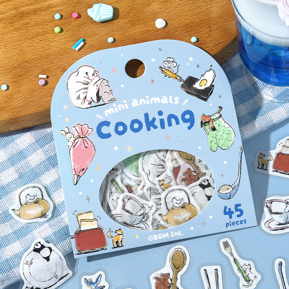 Packaging of mini animal stickers themed around cooking on a checkered tablecloth.
