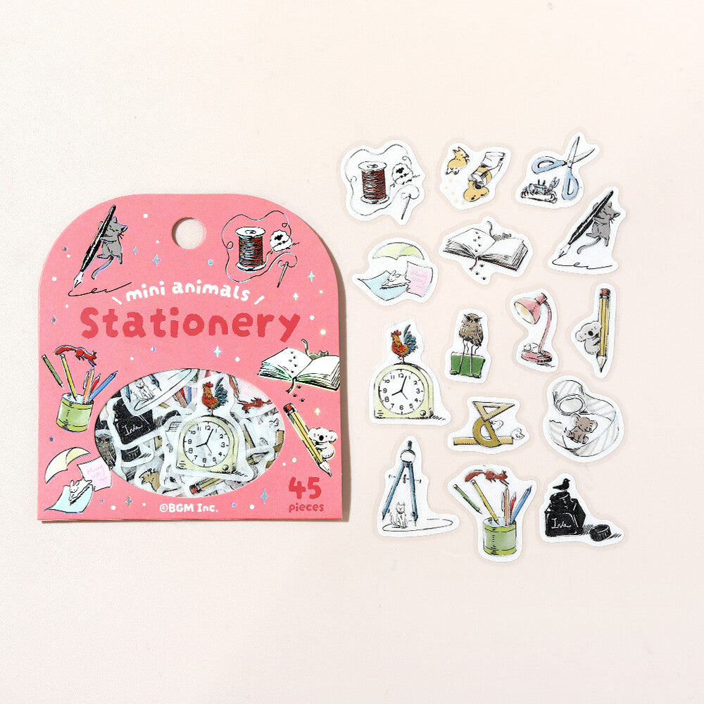 Stationery-themed stickers with a pink packaging on a light pink background