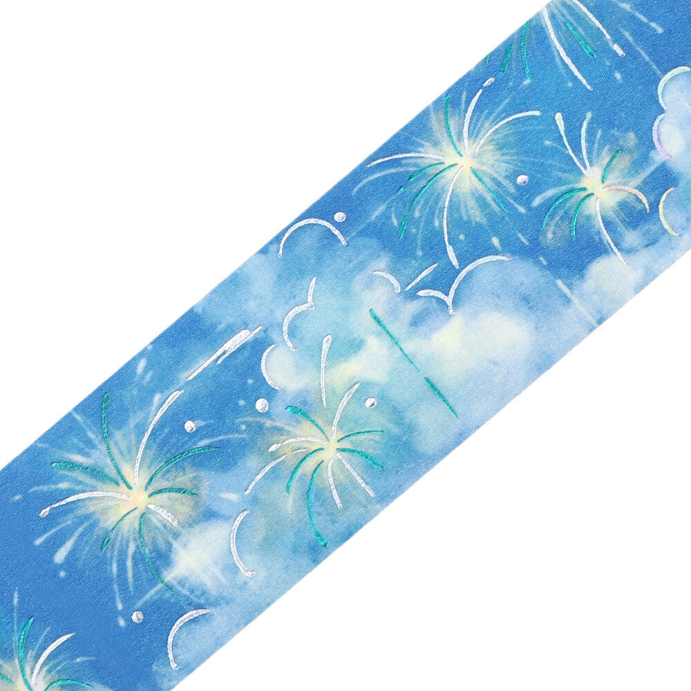 Decorative paper strip with fireworks design on a blue background