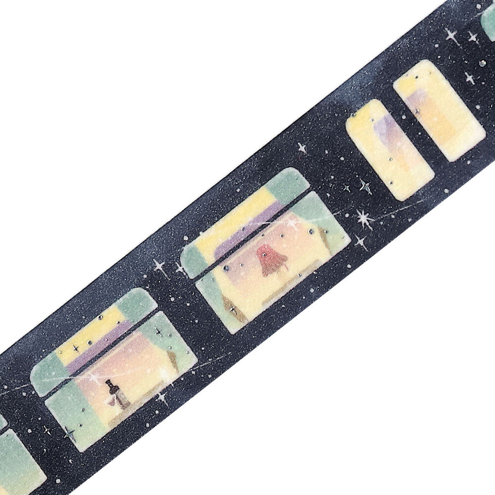 Decorative tape with train window designs on a black background