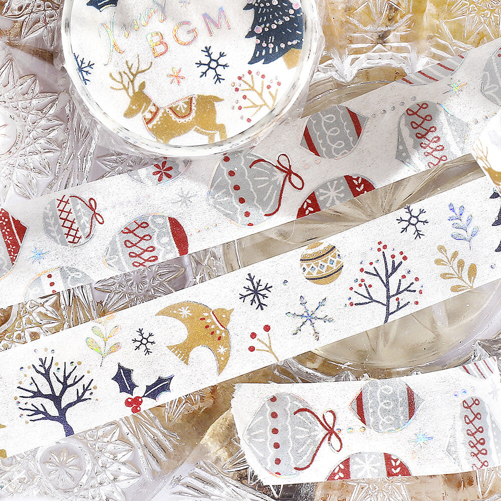 Decorative tape with Christmas-themed designs on a textured surface