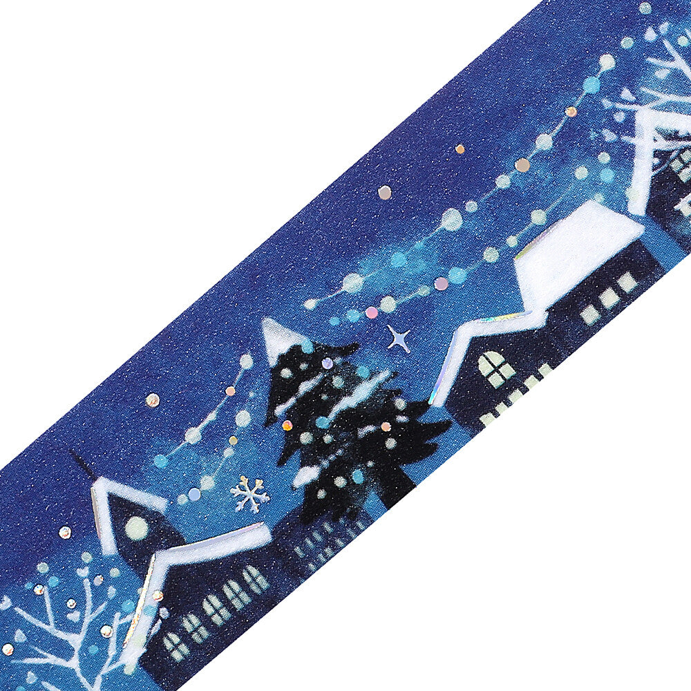 Decorative tape with winter scene design featuring houses and snowflakes on a blue background.