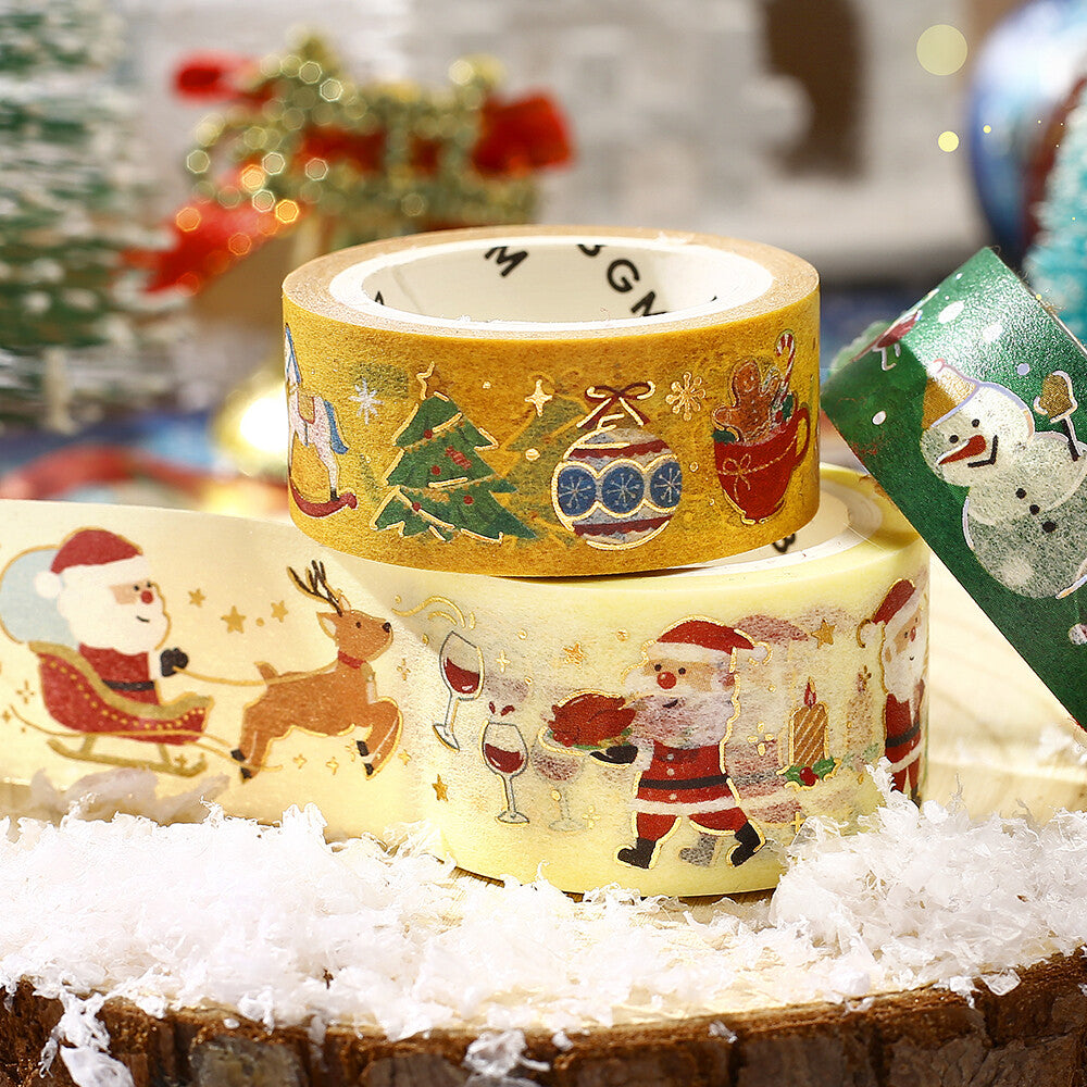 Decorative tape with Christmas designs on a wooden surface with snow-like texture