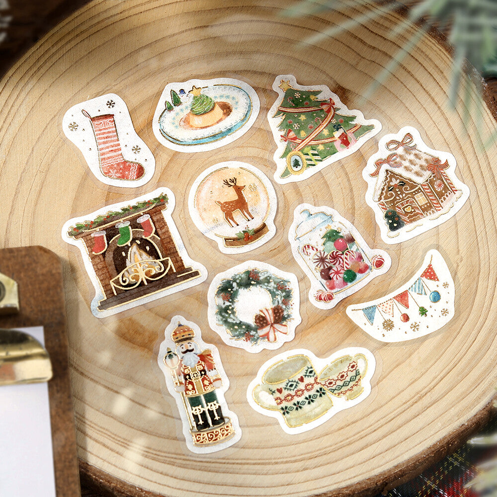 Set of Christmas-themed stickers on a wooden surface