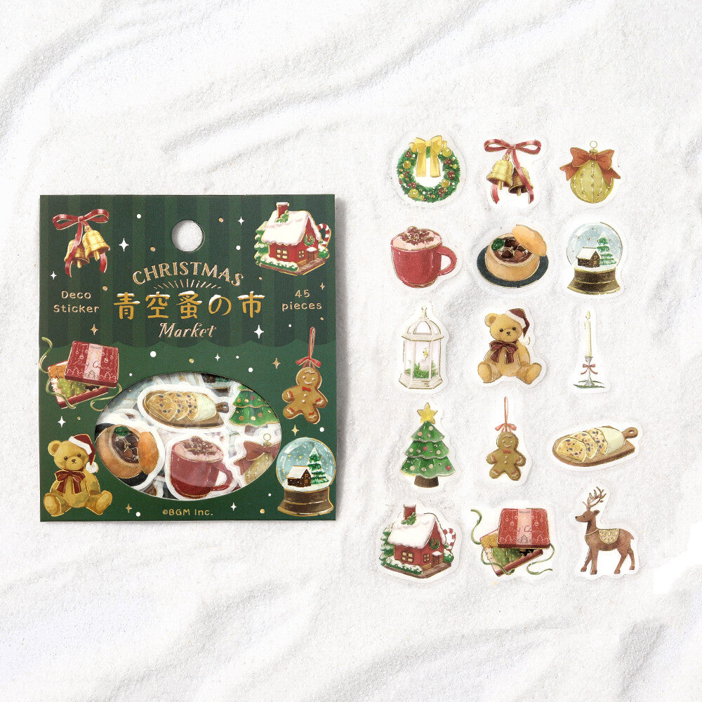Christmas-themed sticker set with packaging on a white background