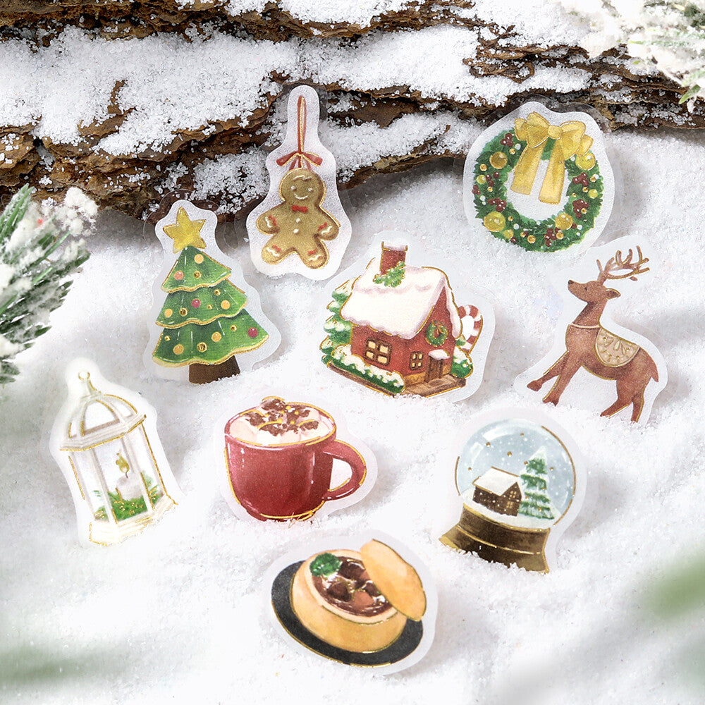 Set of Christmas-themed pins on a snowy background