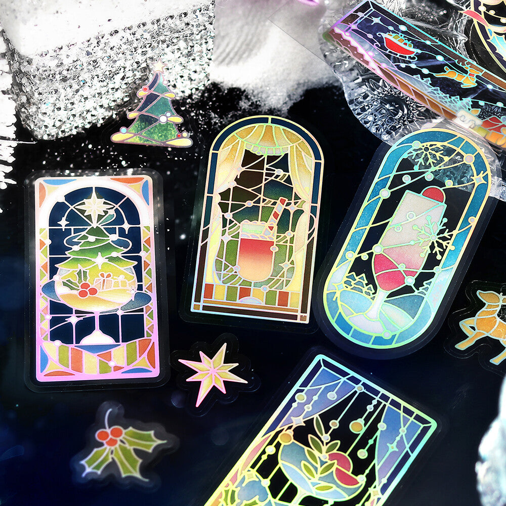 Colorful stained glass-style cards on a dark surface with decorative elements.
