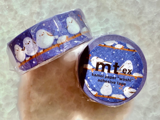 Two rolls of mtex washi adhesive tape with snowman design on a textured surface
