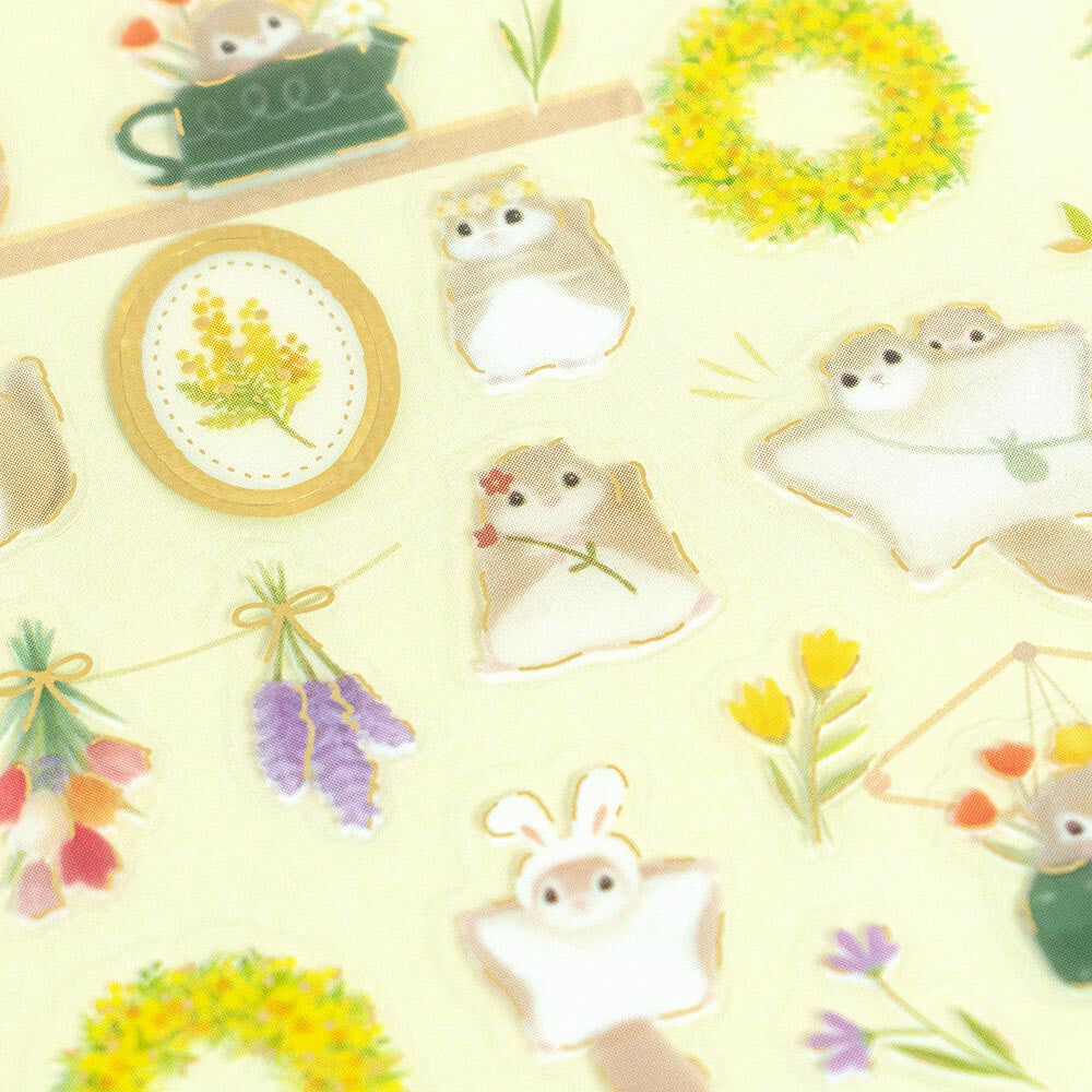 Illustrations of small animals and floral elements on a light yellow background