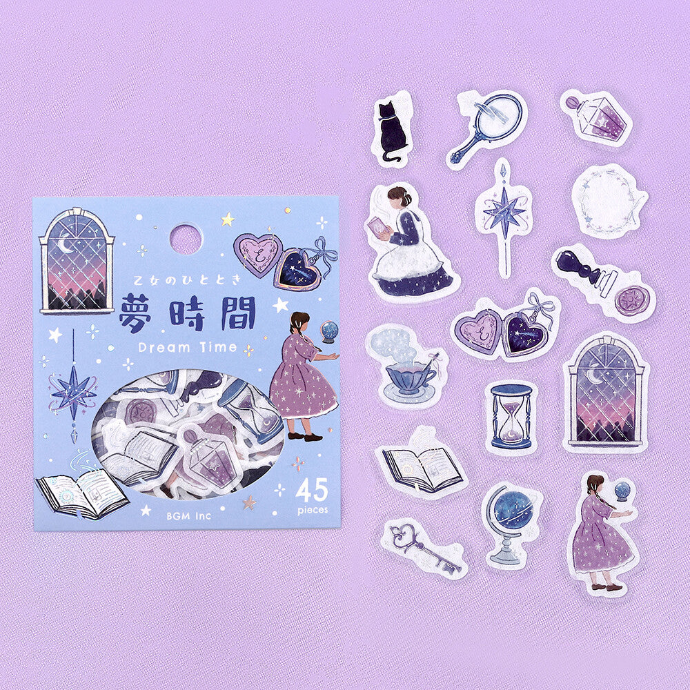 A sheet of illustrated stickers displayed next to its packaging on a light lavender background. The package is light blue with Japanese text and illustrations of a girl in a purple dress, stars, hearts, and a moonlit window.