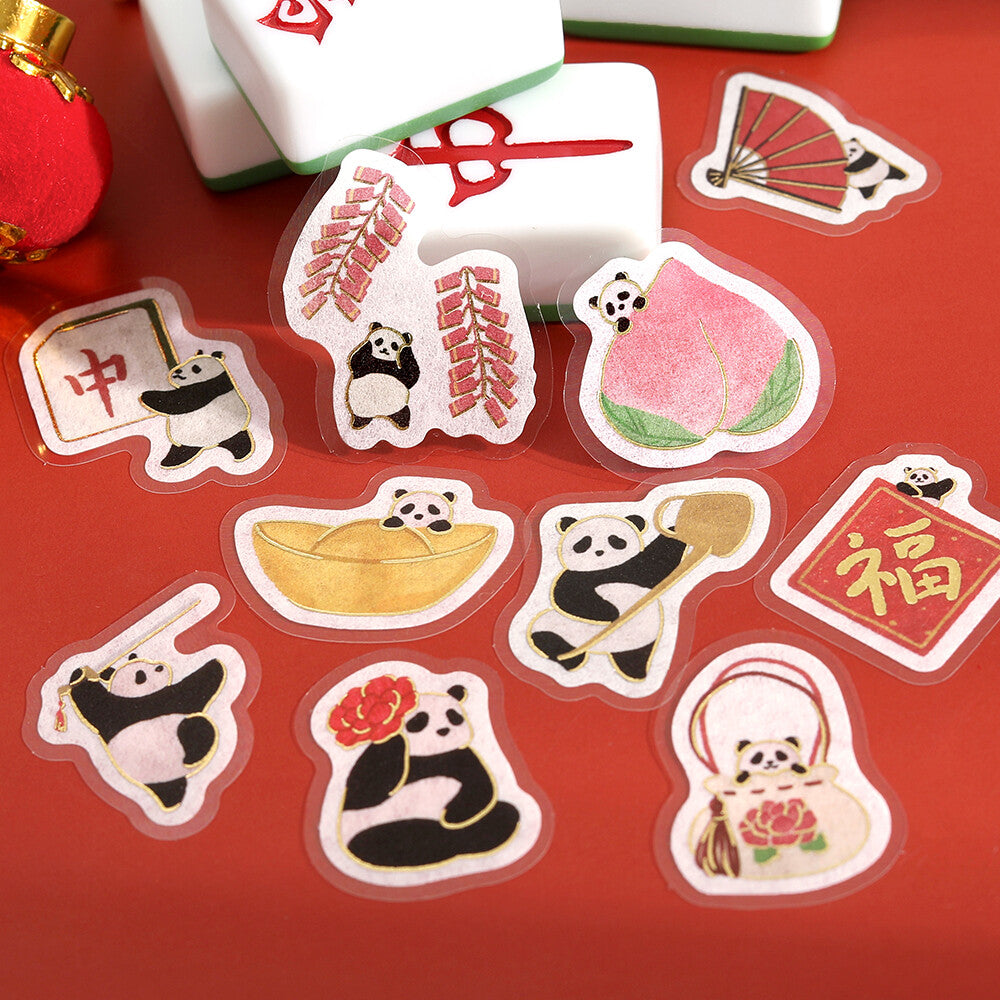Set of decorative stickers with panda designs on a red background