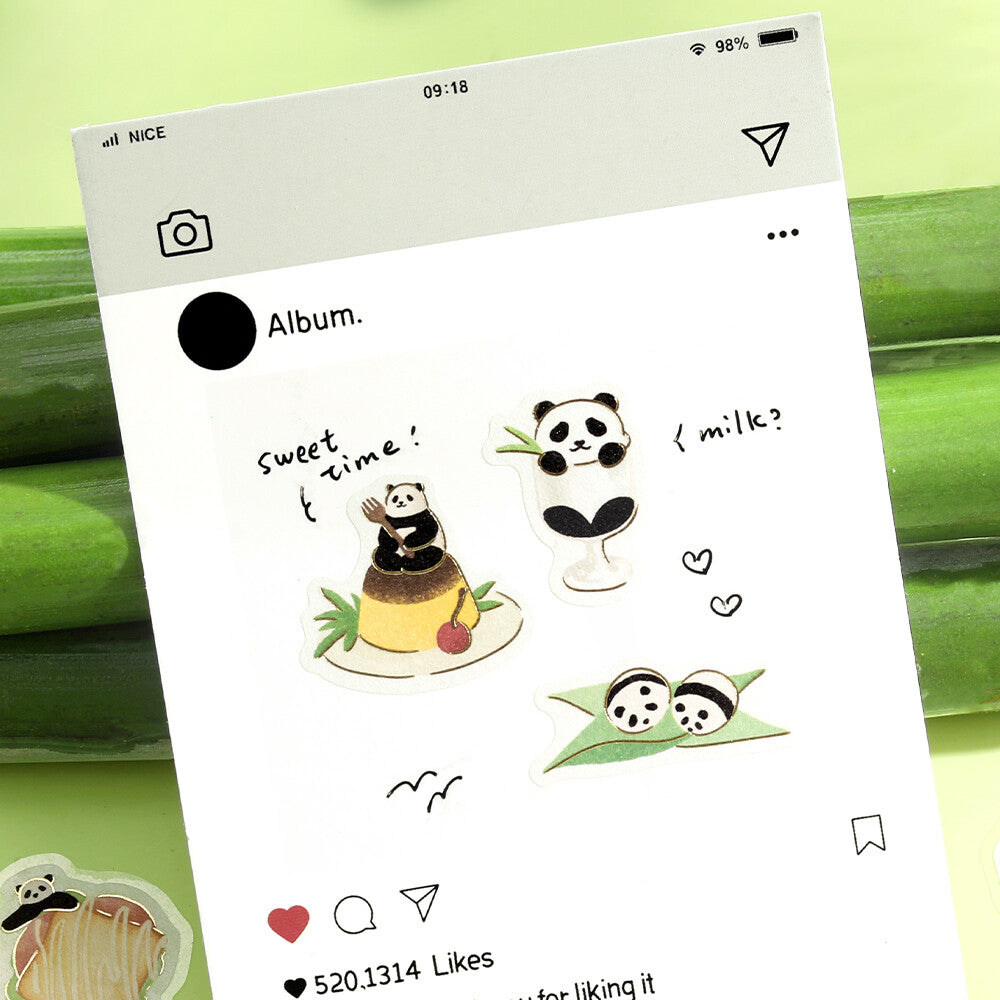 A tilted smartphone screen displays cute panda-themed social media stickers on a white album view, set against a blurred green bamboo background.