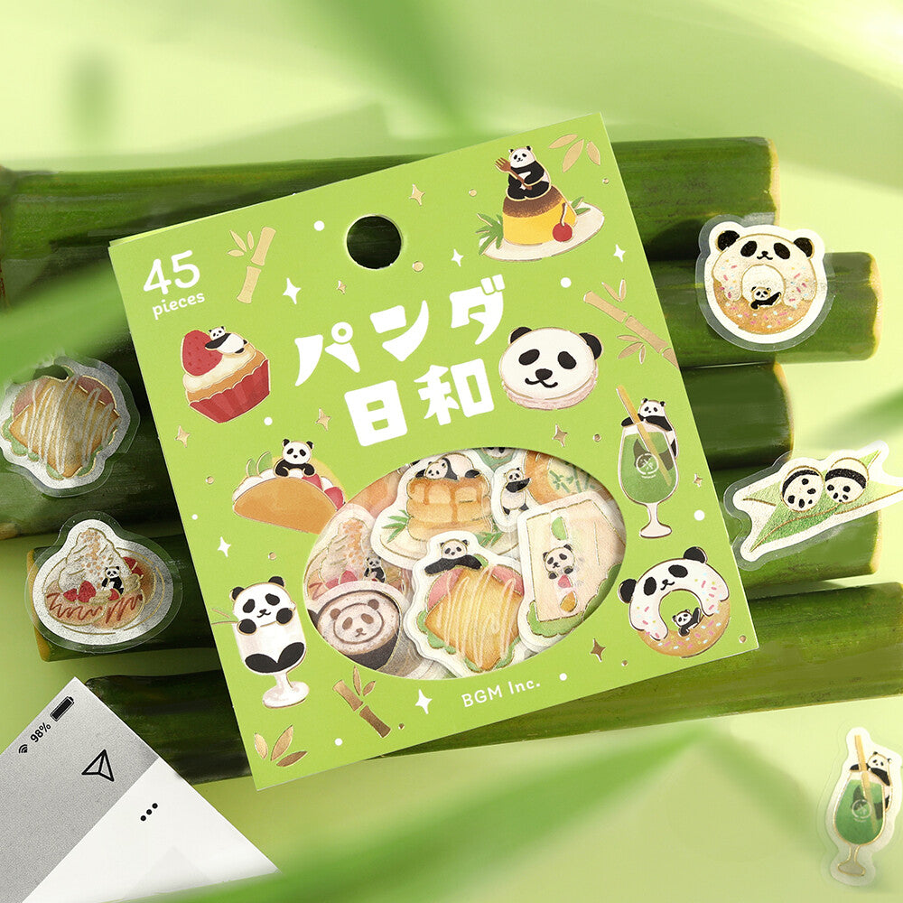 Pack of panda-themed stickers with a green box on a green background