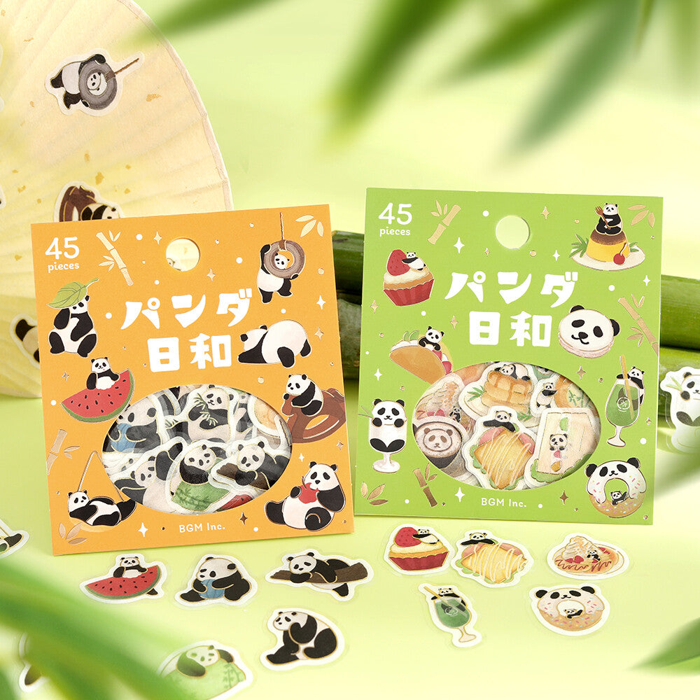 Two colorful sticker packs labeled 45 pieces, one orange and one green, with cartoon panda illustrations and sample panda stickers scattered in front on a pale green background.