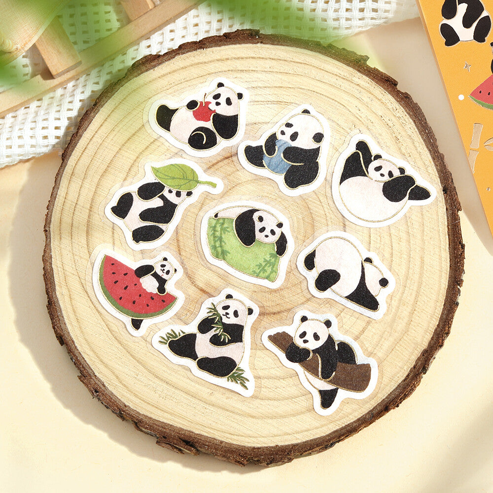 Panda-themed stickers on a wooden surface