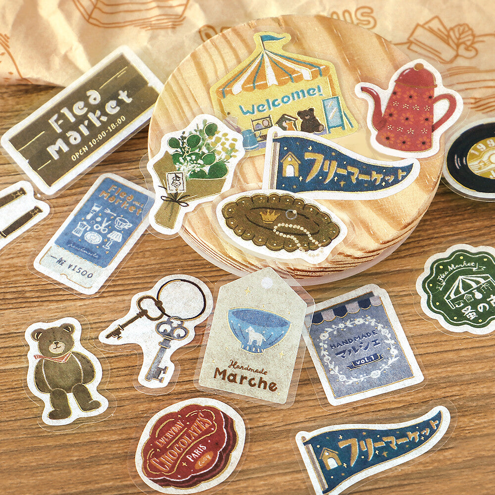 Collection of decorative stickers on a wooden surface