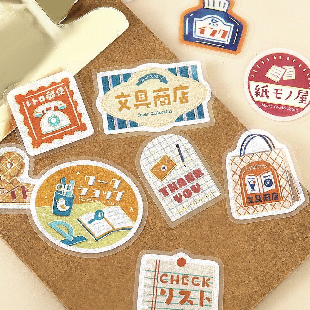 Collection of decorative stickers with various designs on a textured surface