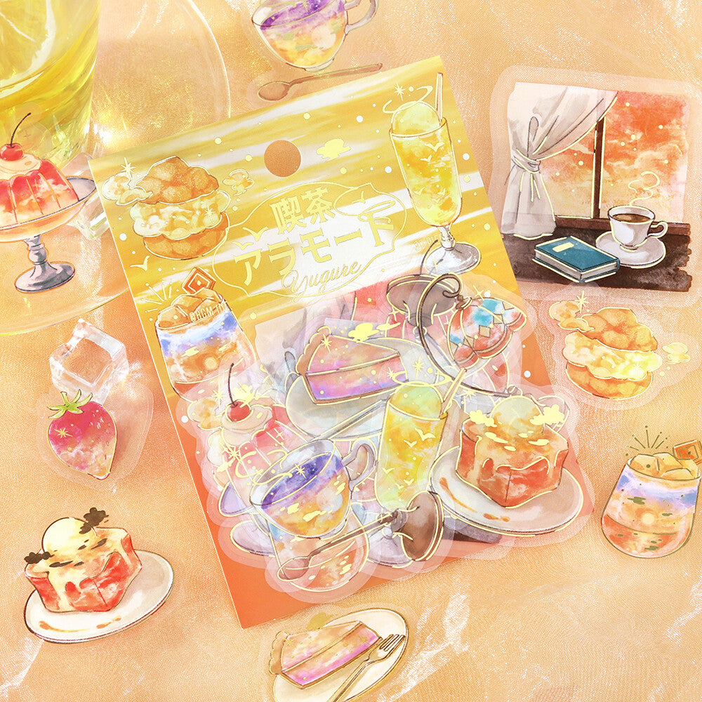 A packaged sheet of decorative stickers or decals featuring illustrated desserts, drinks, and cafe-themed artwork, arranged on a warm beige surface with matching food and drink illustrations around it.
