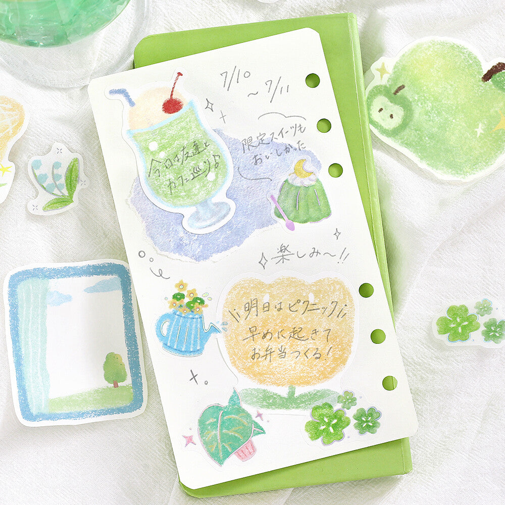 Sticker sheet with green and blue illustrations on a white background