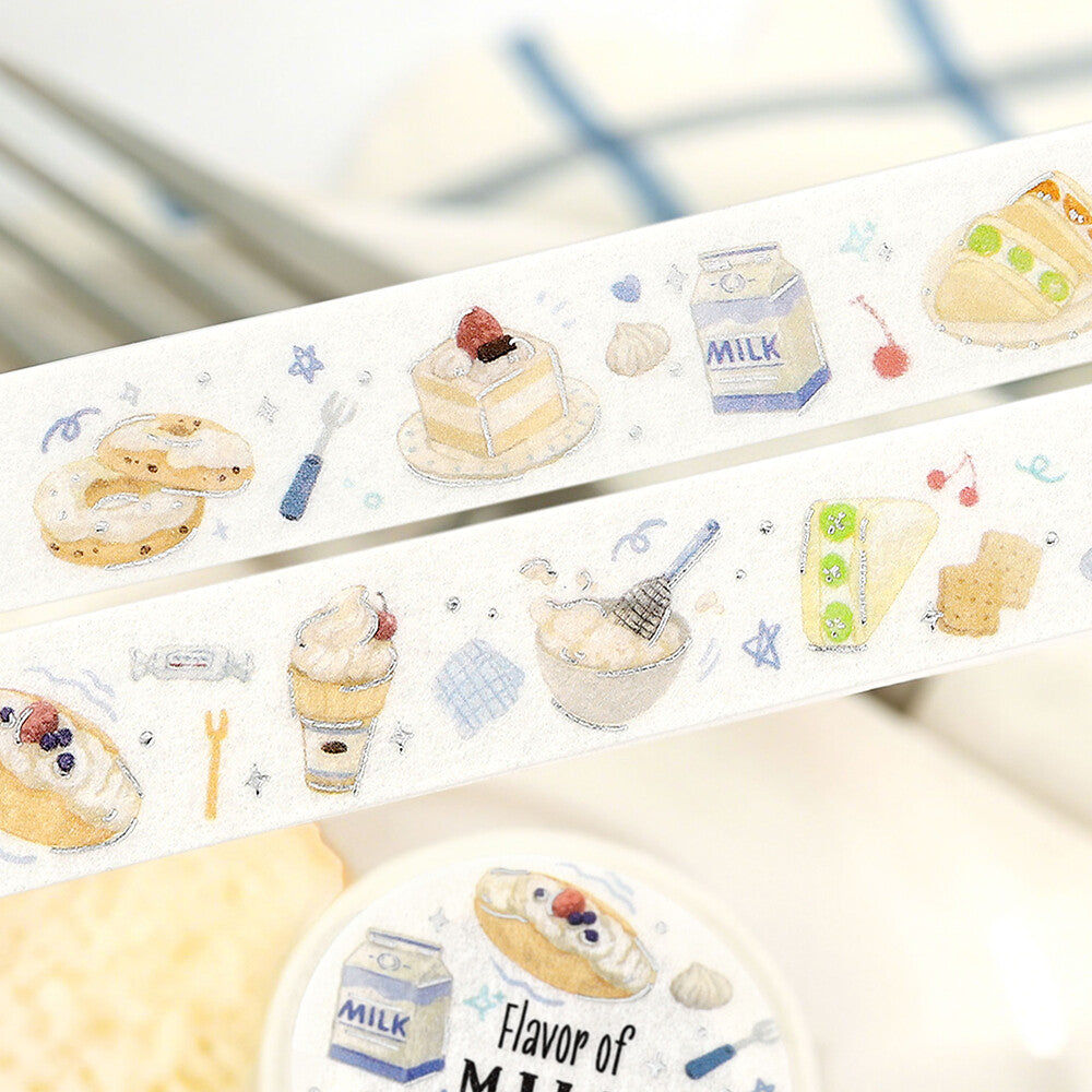 Decorative paper strip with illustrations of desserts and a carton of milk.