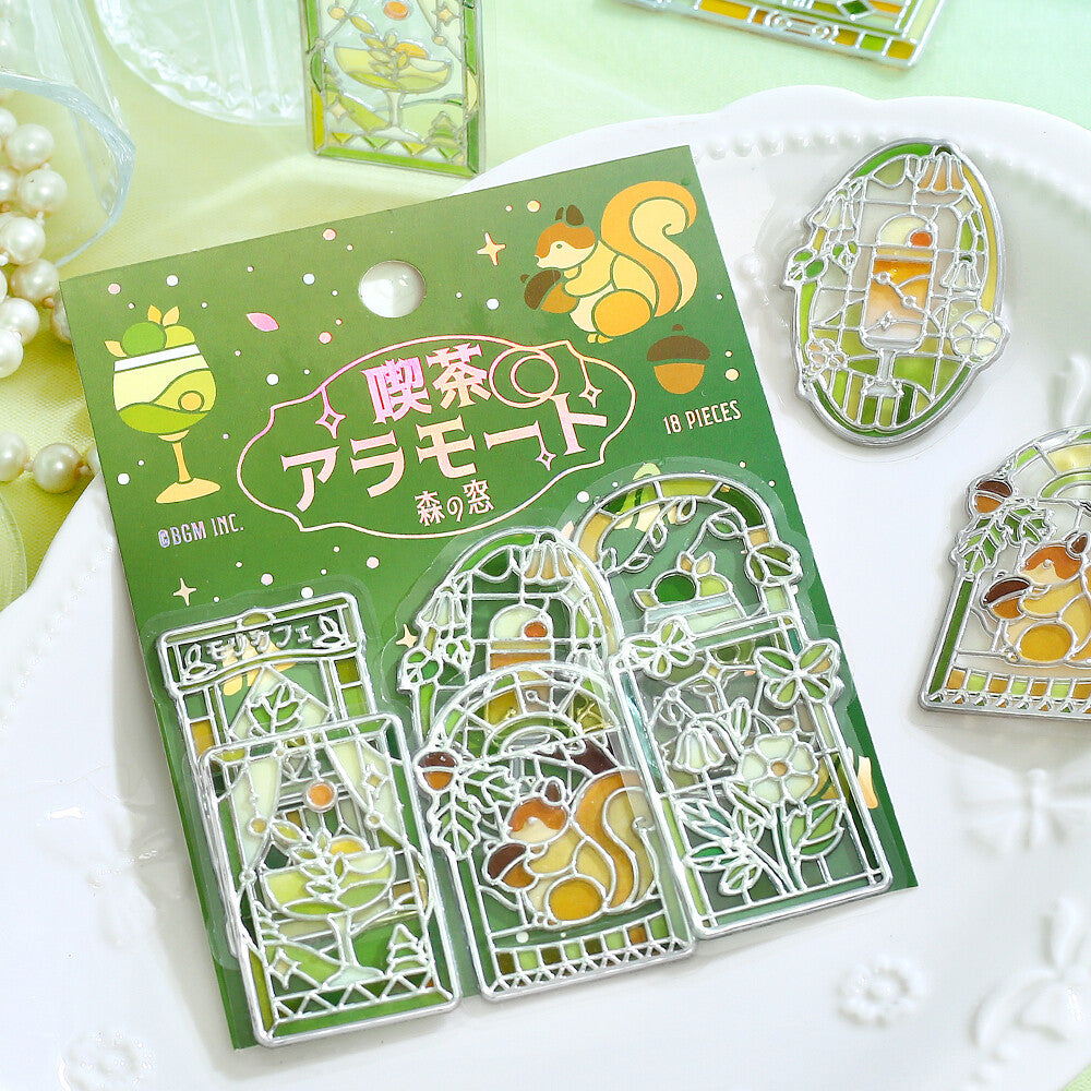 Packet of green themed 3D stickers inspired by the forest and stained glass by BGM on a white plate background