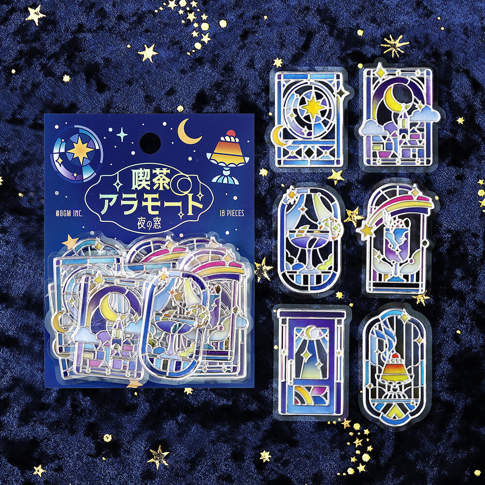 Packet of blue themed stickers seals with pictures of desserts and night scenes on a blue velvet background