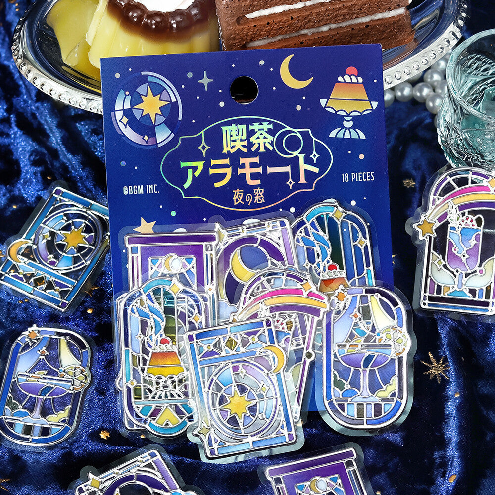 Packet of blue themed stickers seals with pictures of desserts and night scenes on a blue velvet background
