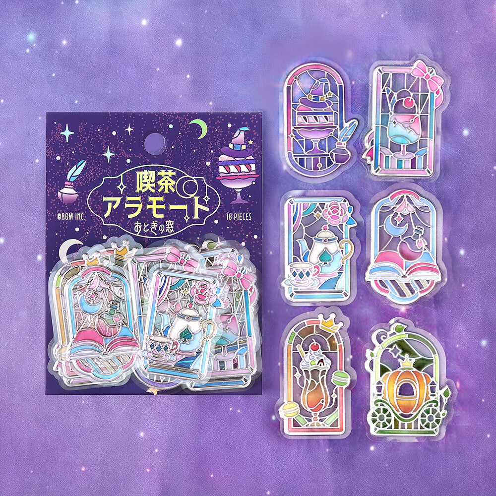 Packet of stickers with purple themed stained glass pictures on purple background