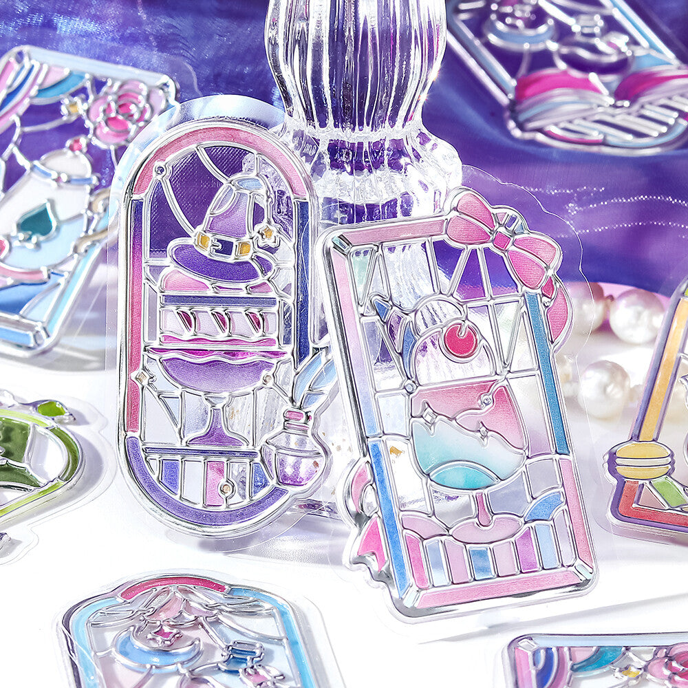 Stickers with purple themed stained glass pictures on metal plate background