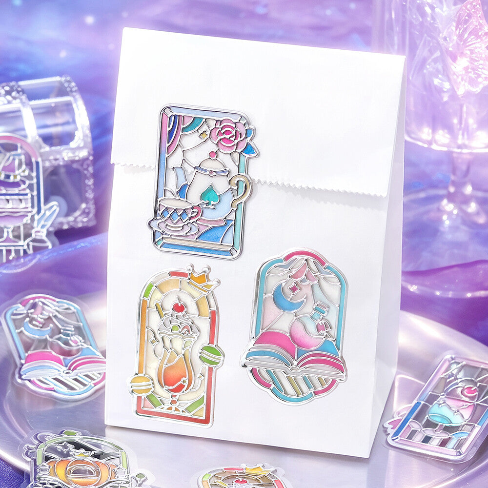 Bag and stickers with purple themed stained glass pictures on metal plate background