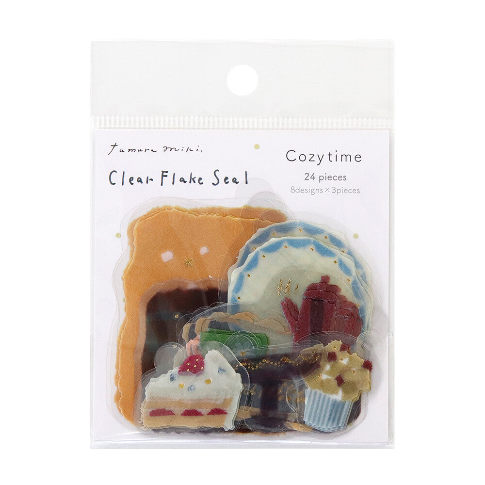 Packaged clear-flake seals with food-themed designs on a white background