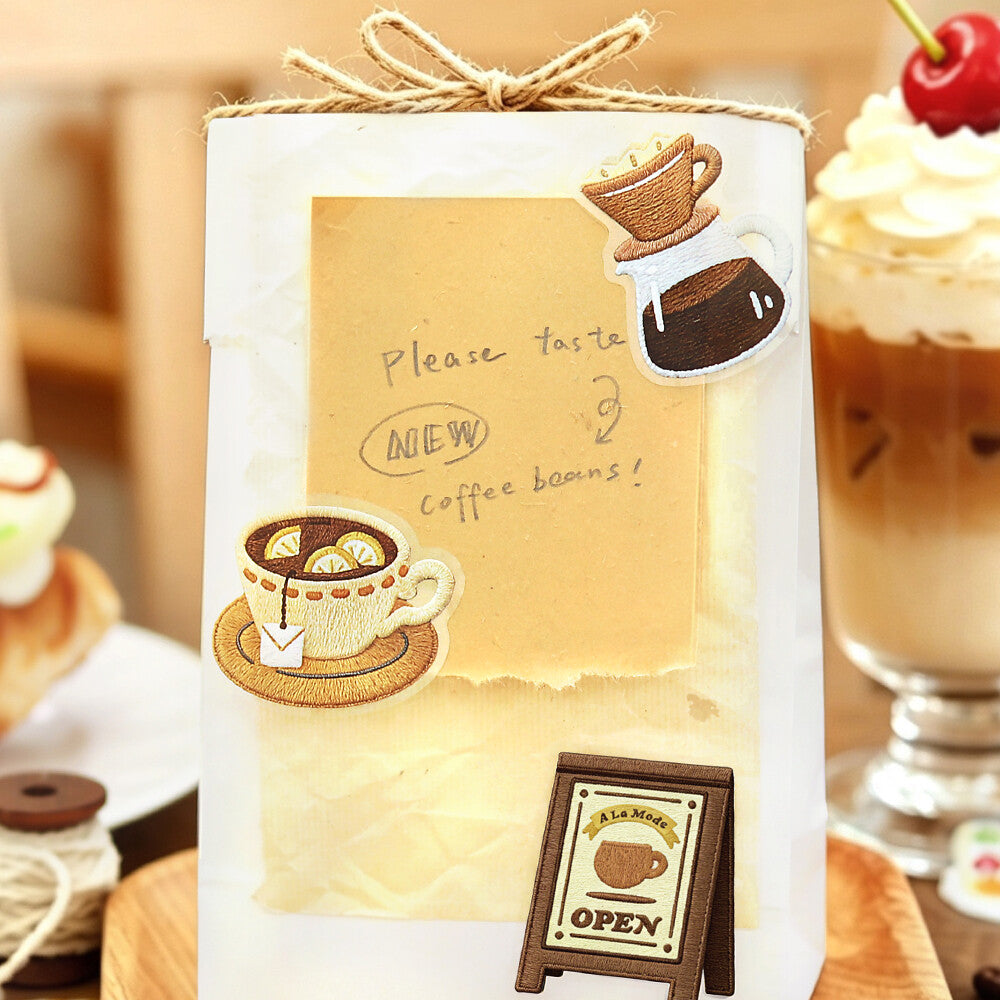 Three coffee themes stickers on a decorative parcel