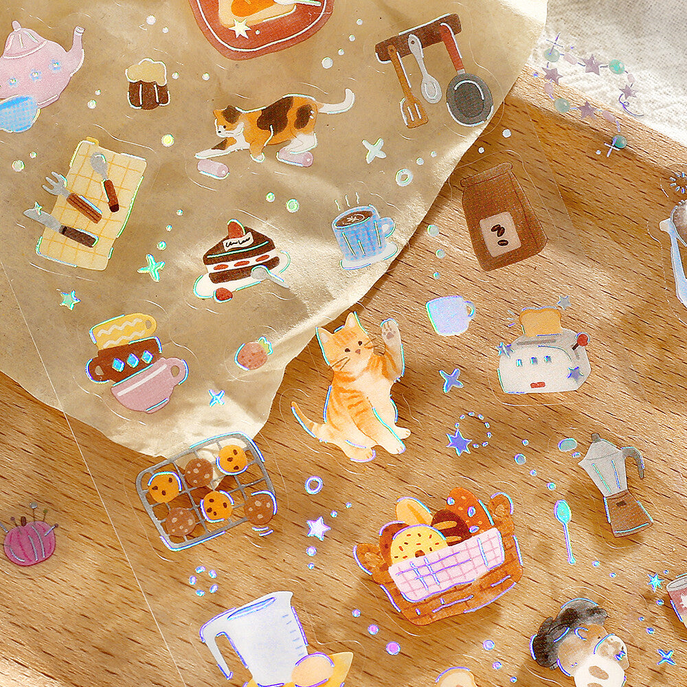Close up picture of clear PET stickers showing cute cat and cake illustrations