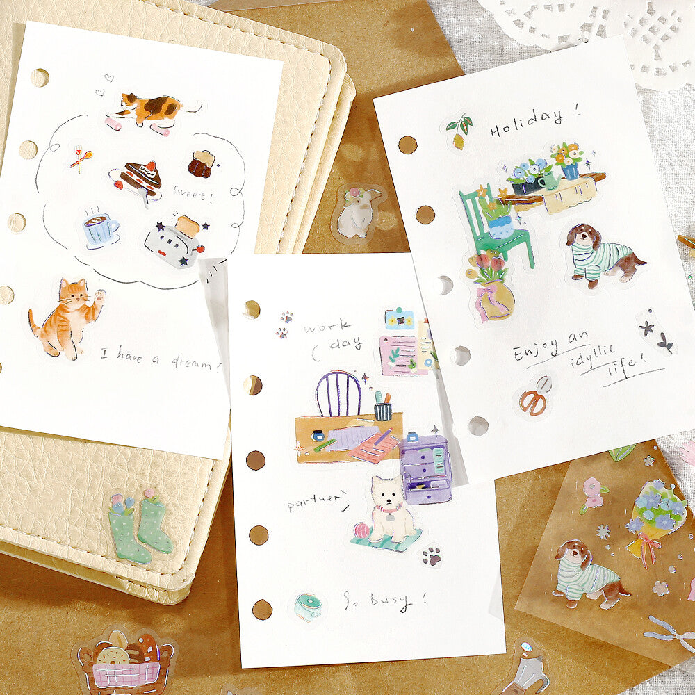 3 pages of white paper with stickers on them 