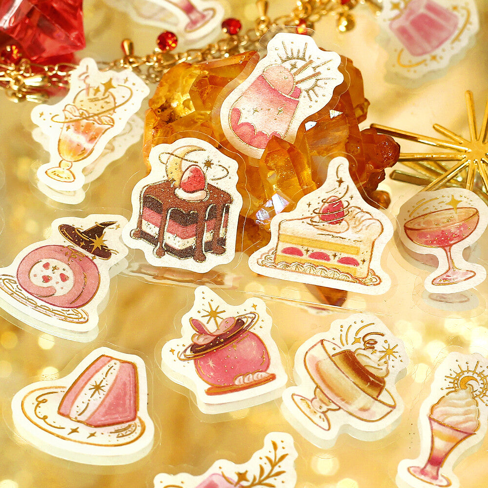 Sticker set with cake and dessert designs on a gold background