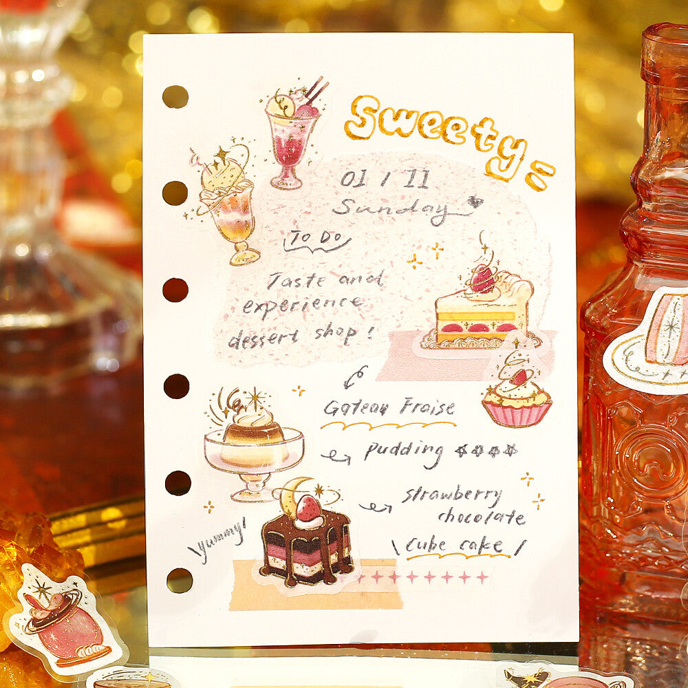 Sheet of planner stickers with dessert-themed designs and text on a decorative background.