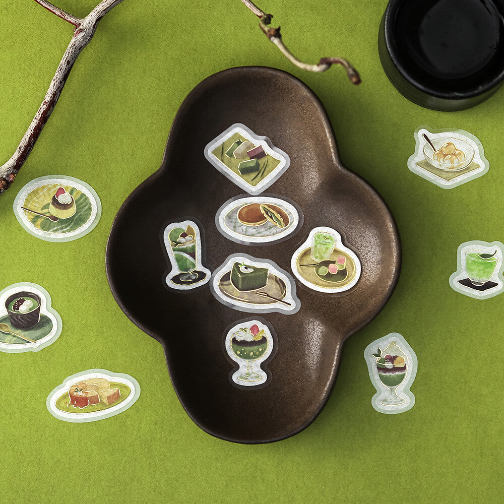 Decorative tray with food illustrations on a green background