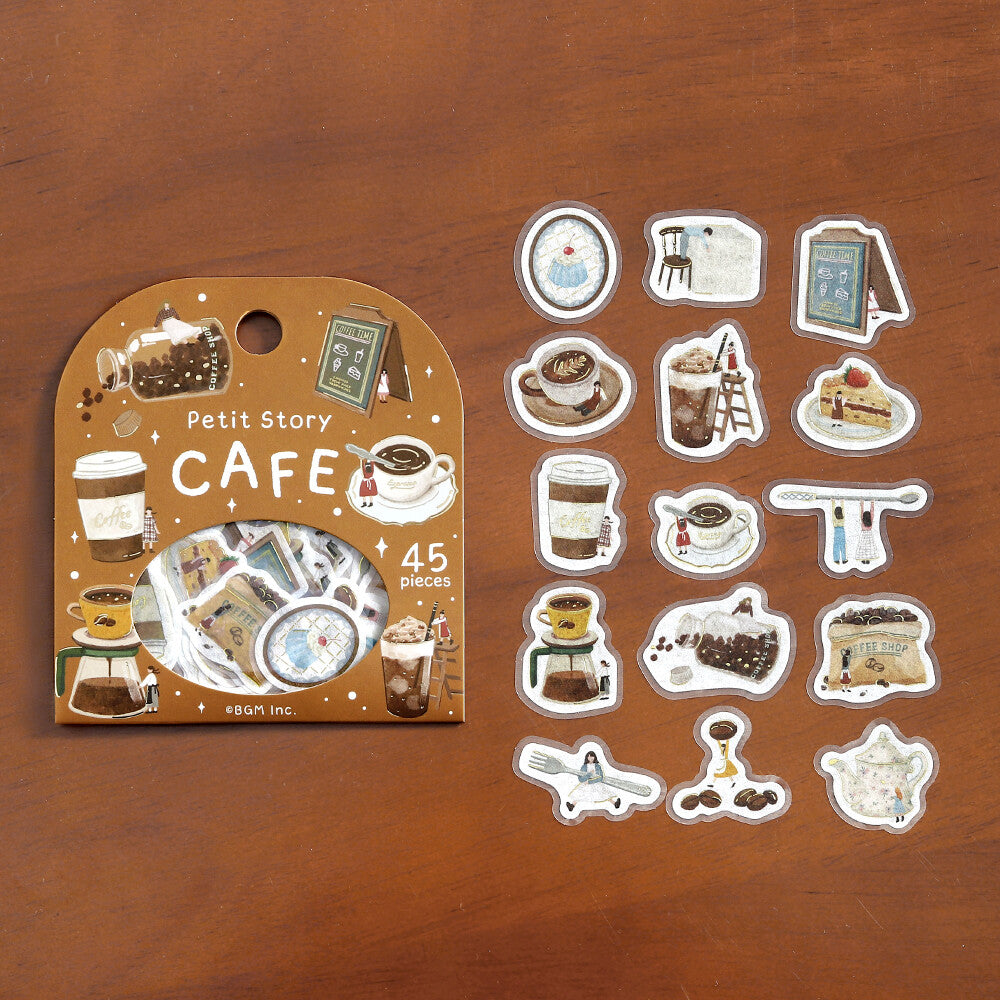 Pack of Petit Story Cafe stickers on a wooden surface